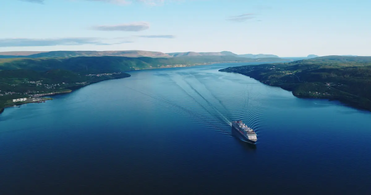 Cruise ship gliding across the deep-blue Bay of Islands