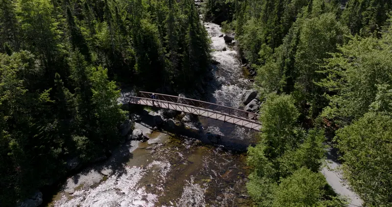 Footbridge over rapids on the Corner Brook Stream Trail